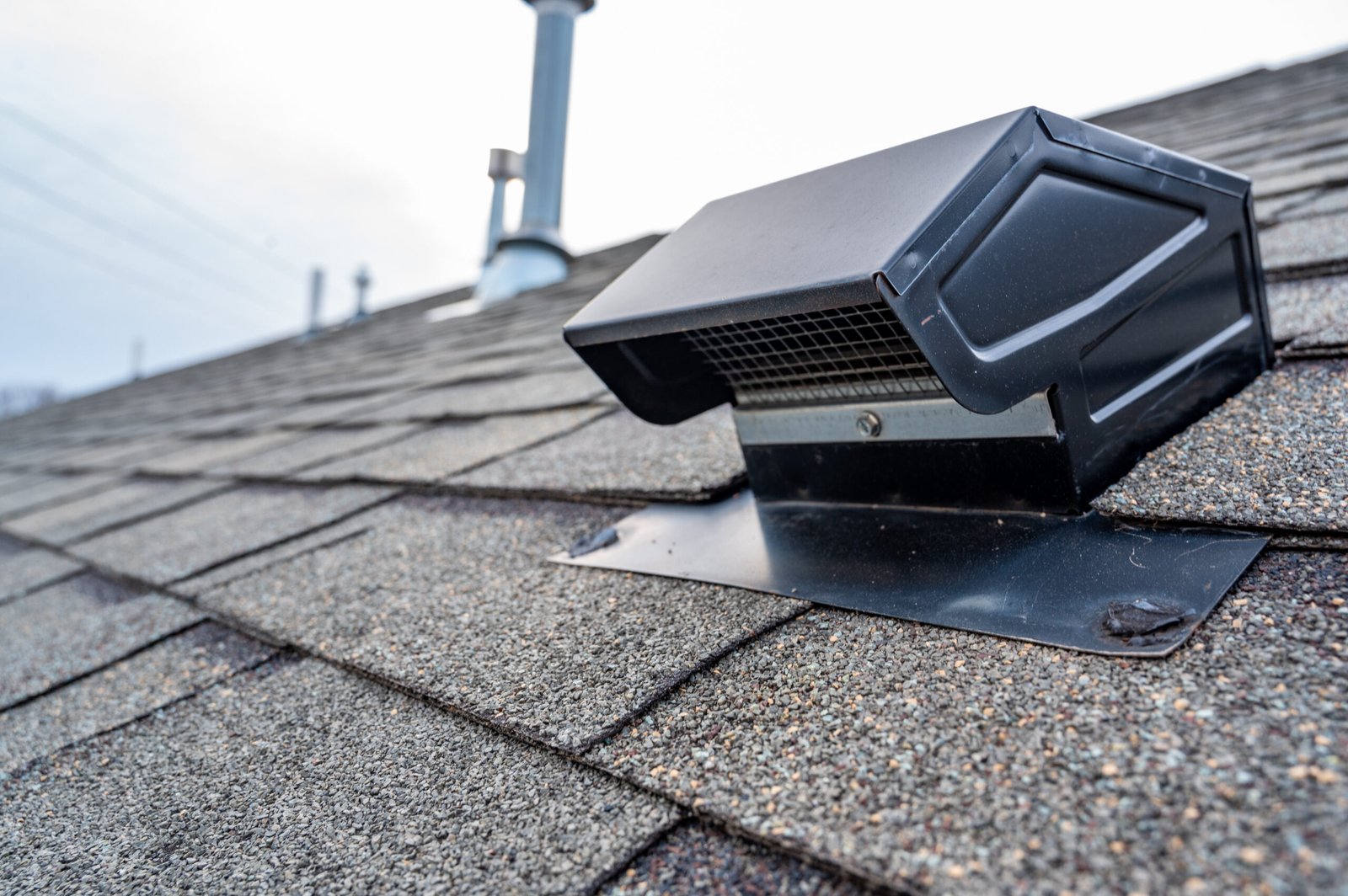 ajax-roof-repair Roof vent installed on a shingle roof by roofing contractor in Ajax